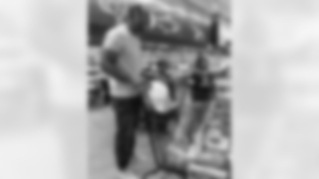 New Orleans Saints safety Justin Reid hosted his annual "Justin's Thanksgiving Grocery Grab" shopping spree for local shoppers on Nov. 24, 2025. Saints safety Terrell Burgess assisted their teammate during the event.