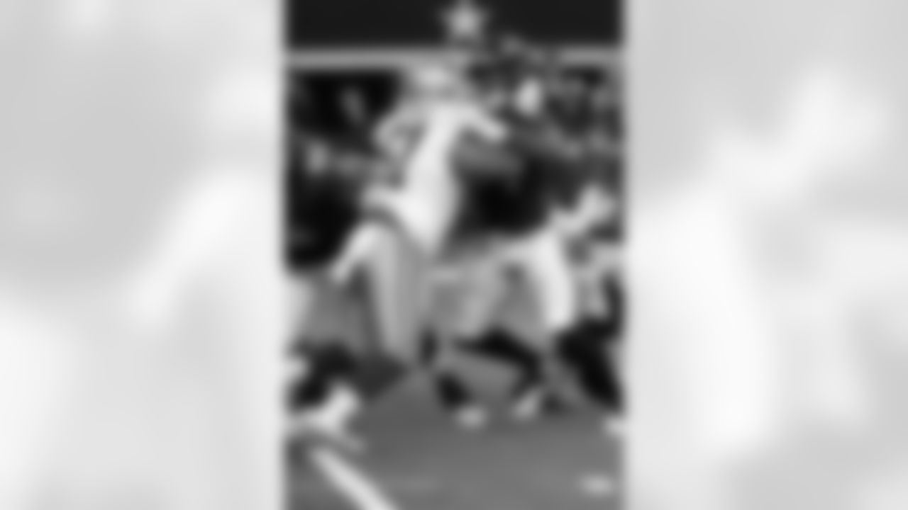 Baltimore Ravens tight end Zaire Mitchell-Paden (84) blocks Dallas Cowboys defensive end Earnest Brown (51) during the first half of a preseason NFL football game, Saturday, Aug. 16, 2025 in Arlington, Texas. The Ravens defeated the Cowboys, 31-13.