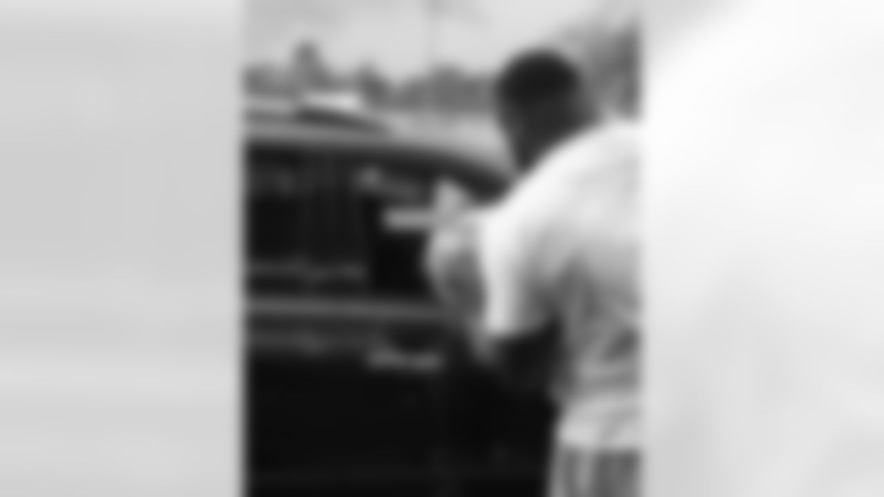 New Orleans Saints defensive tackle Davon Godchaux hosted a Thanksgiving turkey distribution for local residents at the COPAC Community Center on Nov. 25, 2025. The Plaquemine High School football team assisted Godchaux in the giveaway.