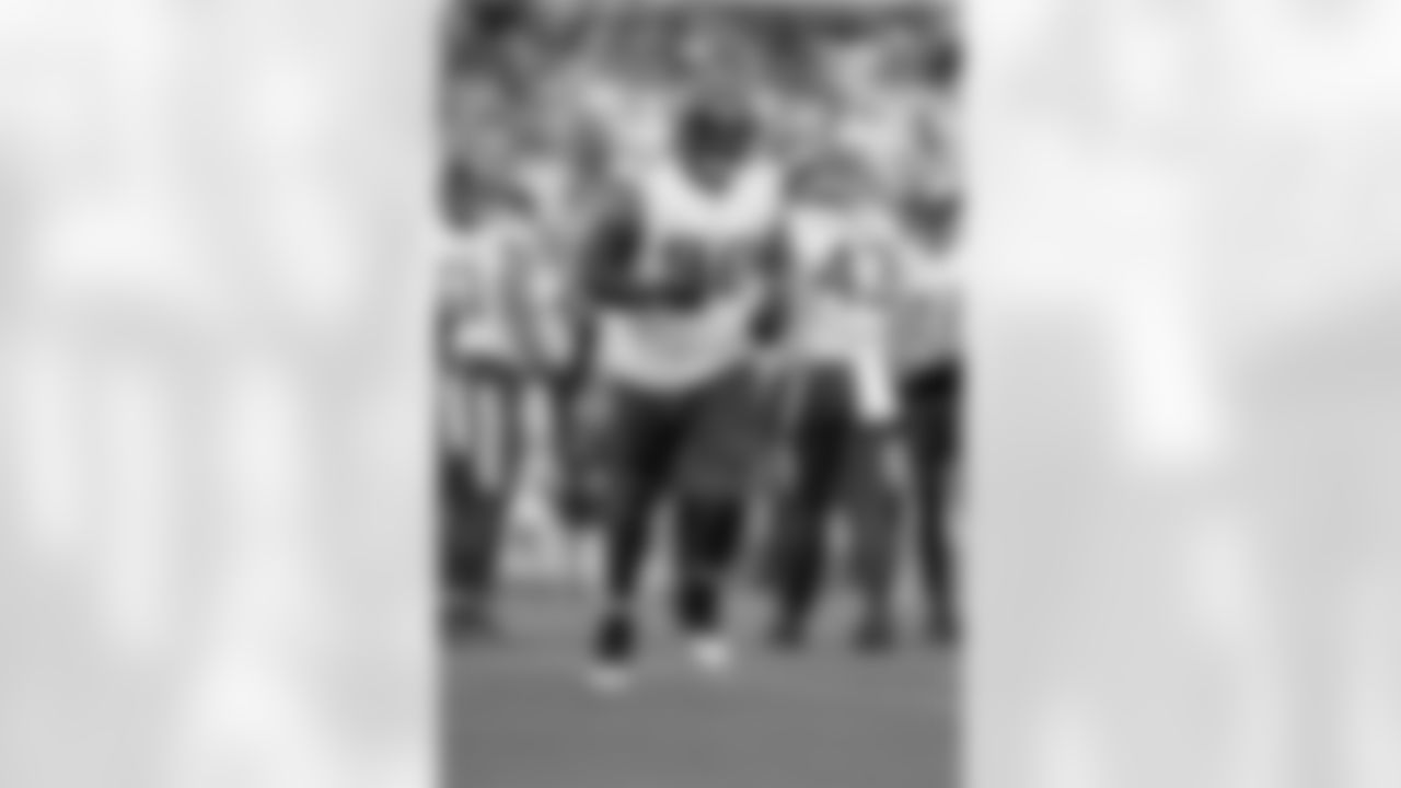 Minnesota Vikings defensive end Jonathan Bullard (90) runs off the field during an NFL football game against the Jacksonville Jaguars, Sunday, Nov. 10, 2024, in Jacksonville, Fla. The Vikings defeated the Jaguars 12-7.