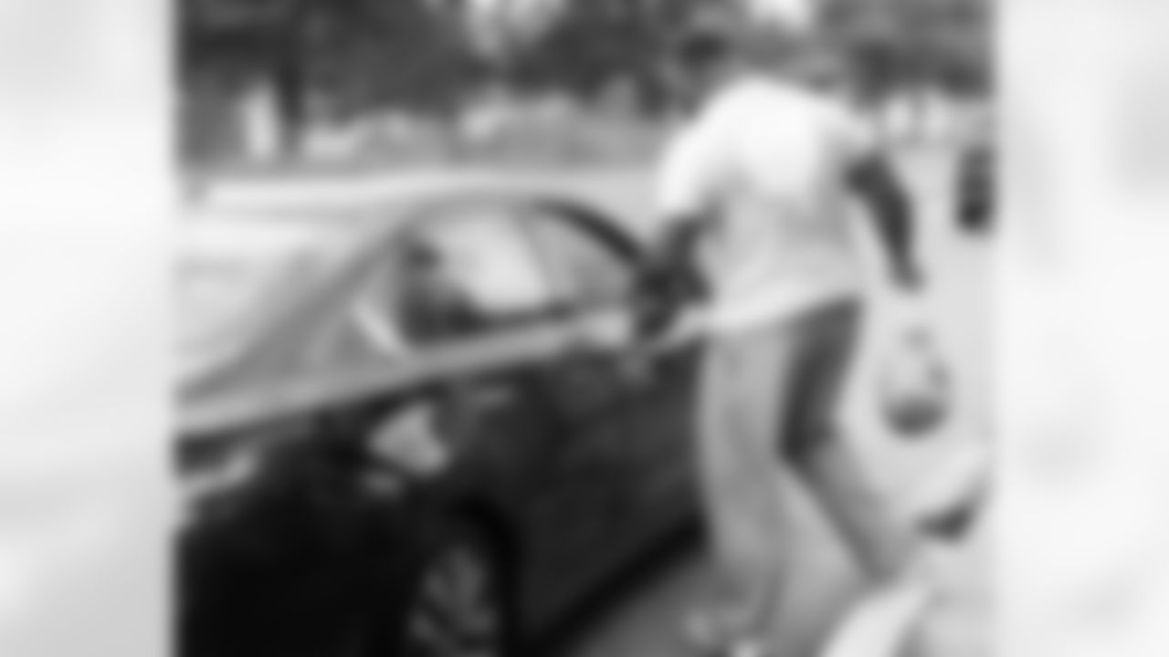 New Orleans Saints defensive tackle Davon Godchaux hosted a Thanksgiving turkey distribution for local residents at the COPAC Community Center on Nov. 25, 2025. The Plaquemine High School football team assisted Godchaux in the giveaway.