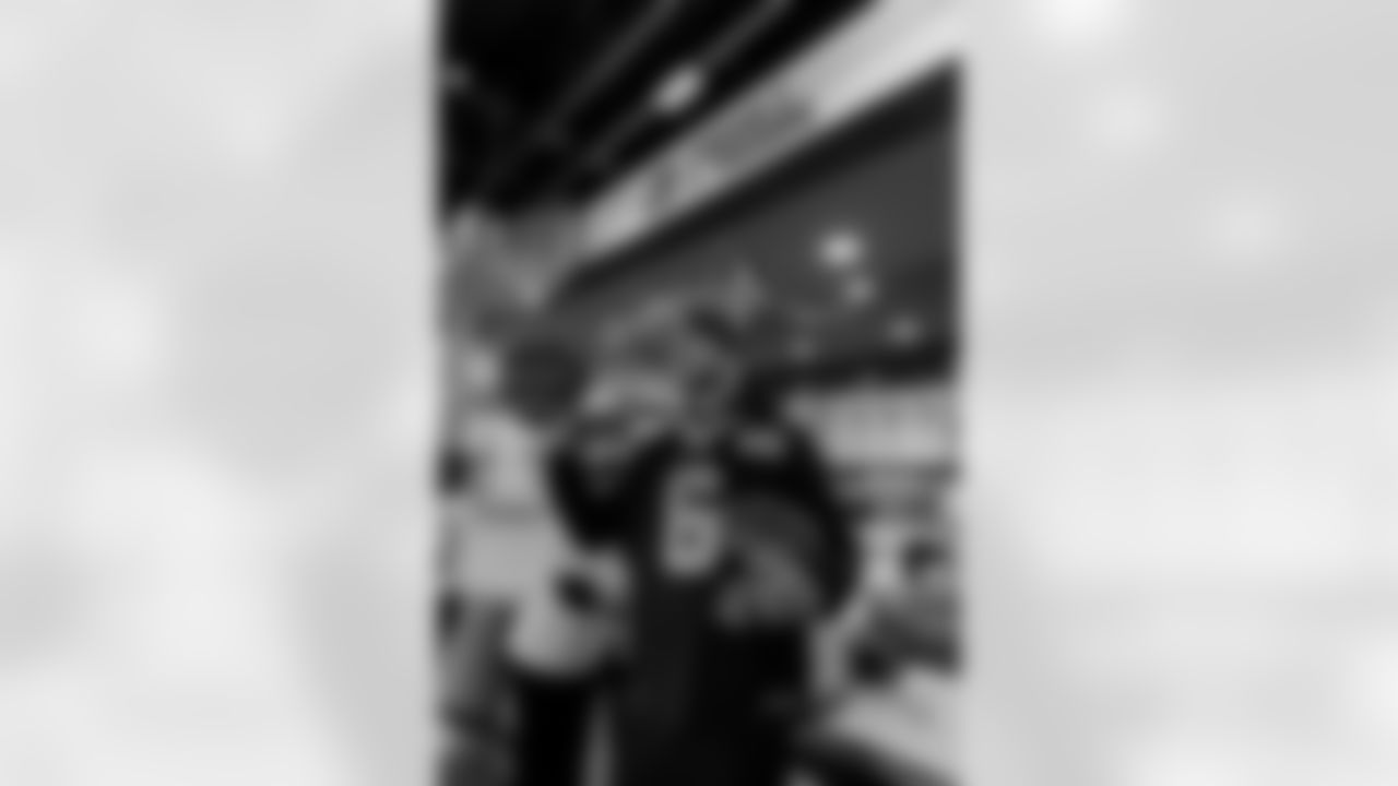 New Orleans Saints quarterback Tyler Shough and defensive end Cam Jordan joined Raising Cane's to surprise 100 kids from the Boys and Girls Club of Metro Louisiana with new bikes and helmets for the holidays on Tuesday, Dec. 9, 2025.