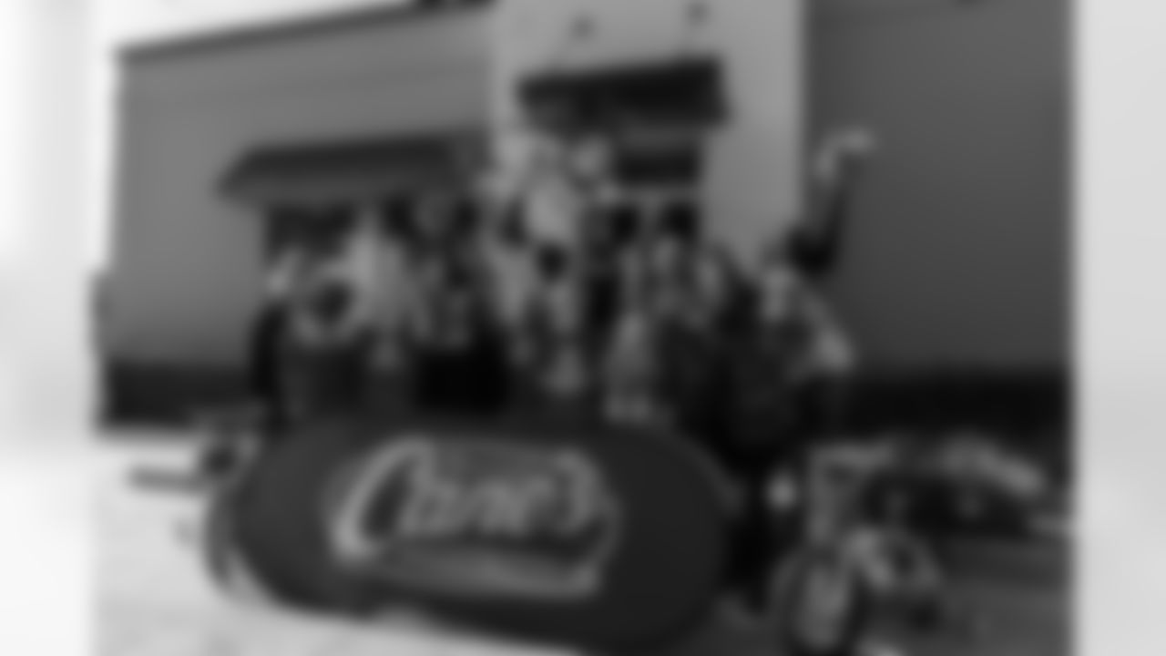 New Orleans Saints quarterback Tyler Shough and defensive end Cam Jordan joined Raising Cane's to surprise 100 kids from the Boys and Girls Club of Metro Louisiana with new bikes and helmets for the holidays on Tuesday, Dec. 9, 2025.