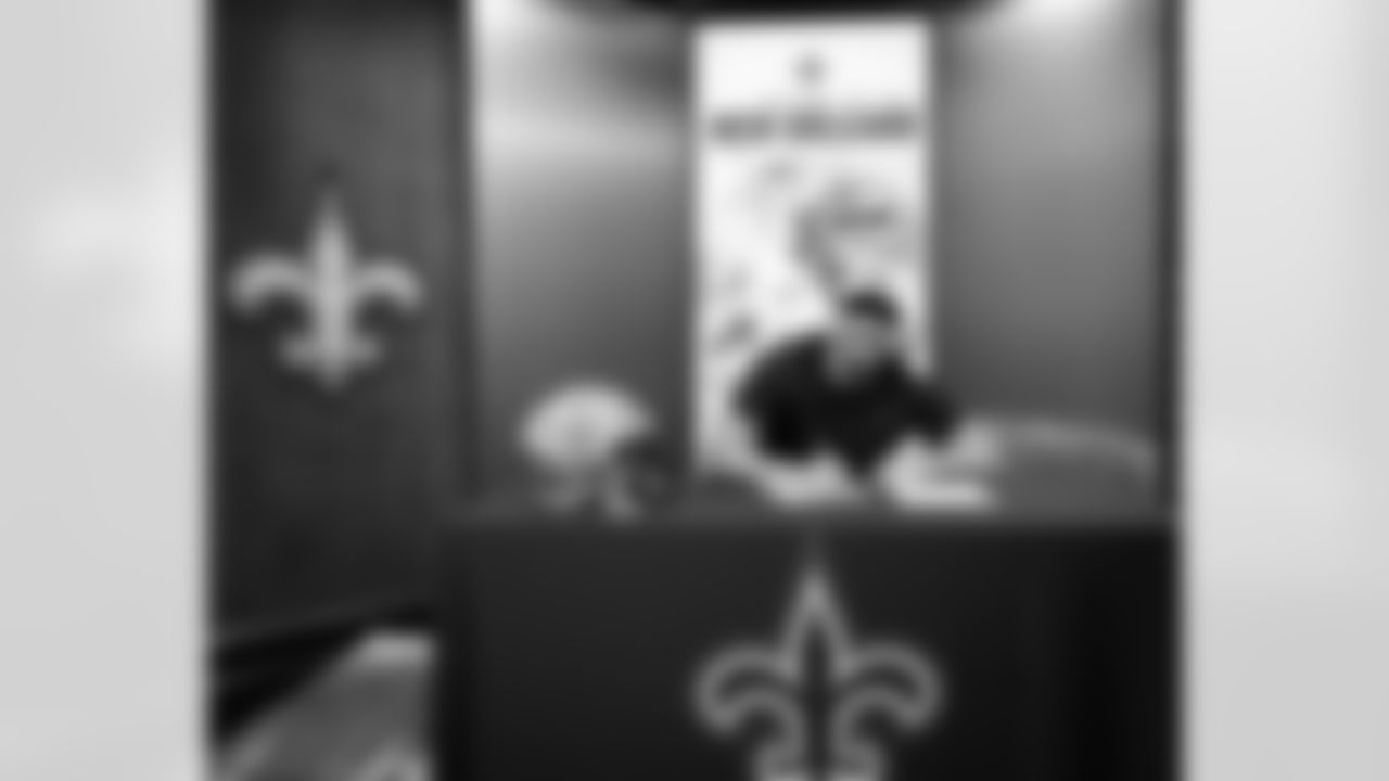 Members of the New Orleans Saints 2025 NFL Draft class sign their rookie contracts at the Ochsner Sports Performance Center.