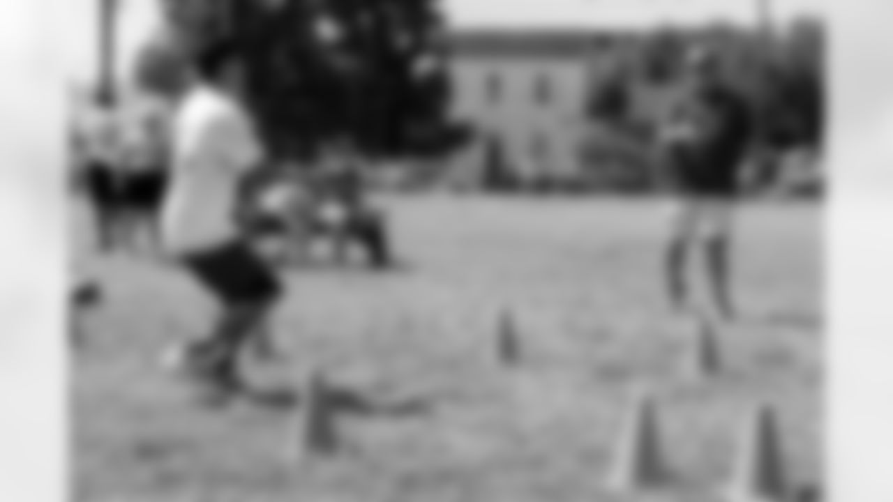 New Orleans Saints legend Garrett Hartley and members of the Saints Cheer Krewe joined students at St. Michael Special School for a field day presented by Hancock Whitney on Wednesday, April 16, 2025.