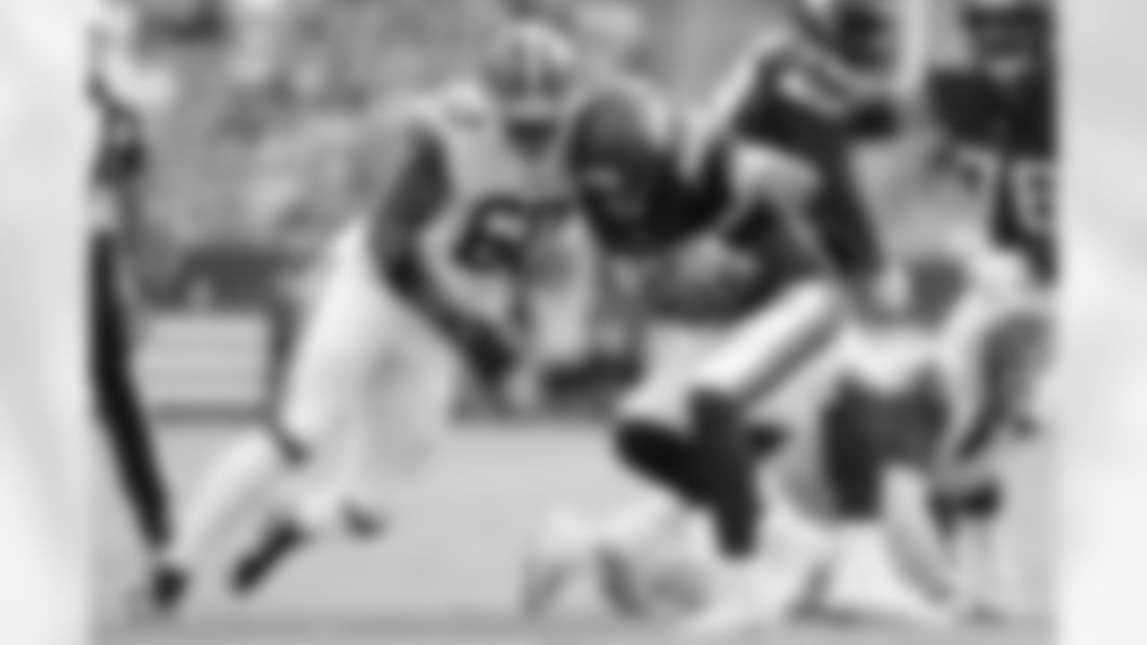 Cleveland Browns defensive end Jeremiah Martin (60) sacks Minnesota Vikings quarterback Nick Mullens (12) during a preseason NFL football game, Saturday, Aug. 17, 2024, in Cleveland.