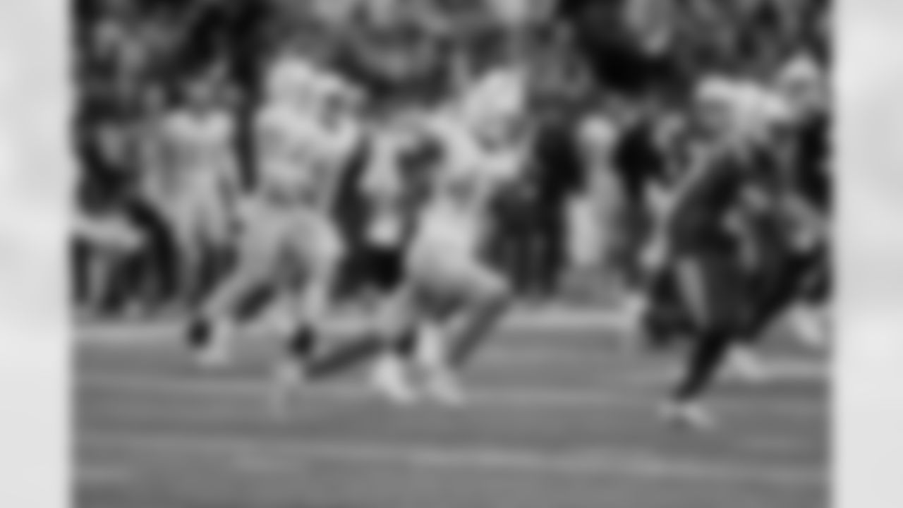 Los Angeles Chargers cornerback Michael Davis (43) runs its the football during an NFL football game against the Indianapolis Colts, Monday, Dec. 26, 2022, in Indianapolis. The Chargers defeated the Colts 20-3.