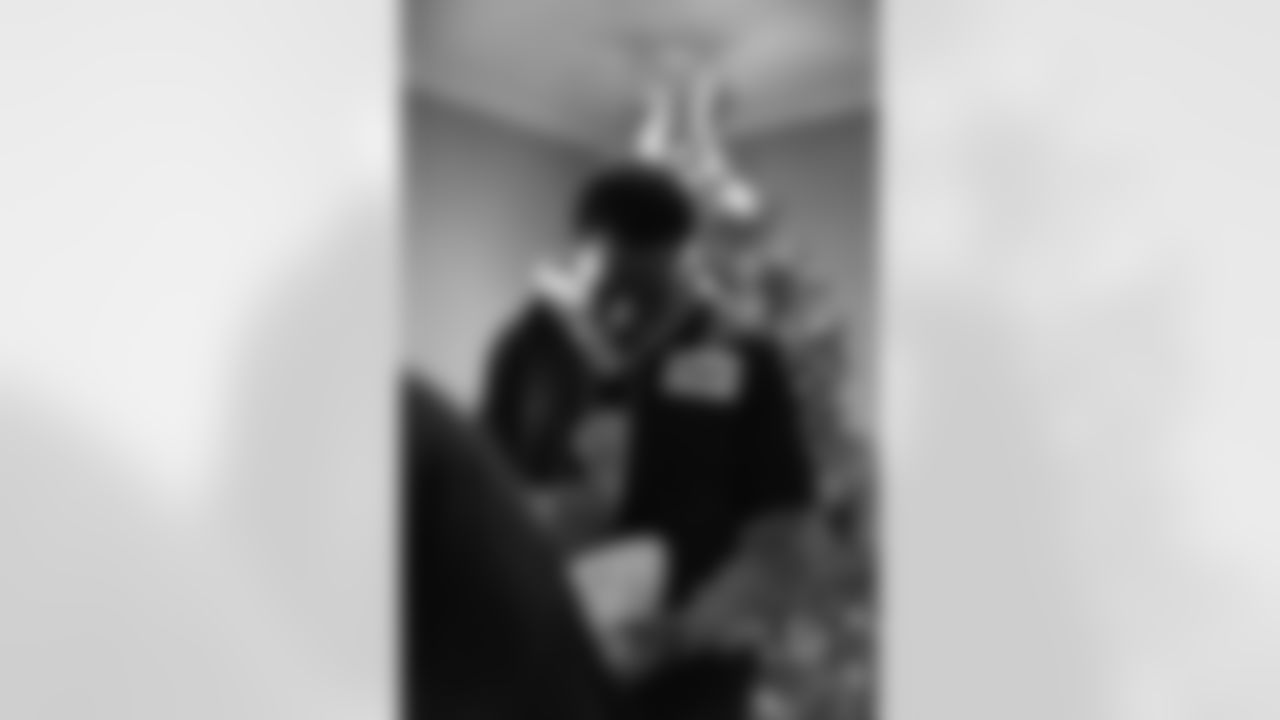 New Orleans Saints tight end Juwan Johnson, cornerback Alontae Taylor, and wide receiver Devaughn Vele attended the Louisiana Cat Hope Ignites Holiday Party on Tuesday, Dec. 16, 2025.