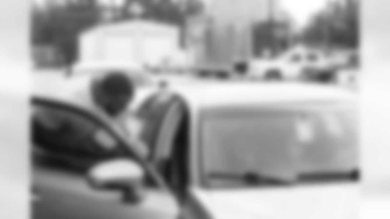 New Orleans Saints defensive tackle Davon Godchaux hosted a Thanksgiving turkey distribution for local residents at the COPAC Community Center on Nov. 25, 2025. The Plaquemine High School football team assisted Godchaux in the giveaway.