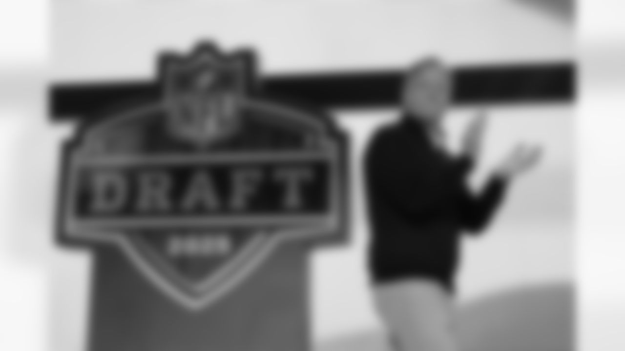 NFL Commissioner Roger Goodell motions on stage during the second round of the NFL football draft, Friday, April 25, 2025, in Green Bay, Wis.
