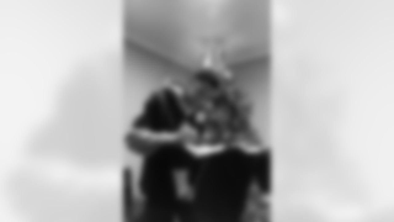 New Orleans Saints tight end Juwan Johnson, cornerback Alontae Taylor, and wide receiver Devaughn Vele attended the Louisiana Cat Hope Ignites Holiday Party on Tuesday, Dec. 16, 2025.