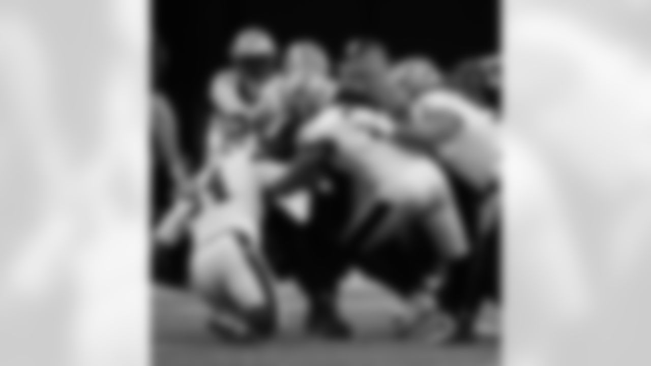 Check out the best photos of the New Orleans offense in their game against the Atlanta Falcons for Week 18 of the 2025 NFL season on Jan. 4, 2026 at Mercedes-Benz Stadium.