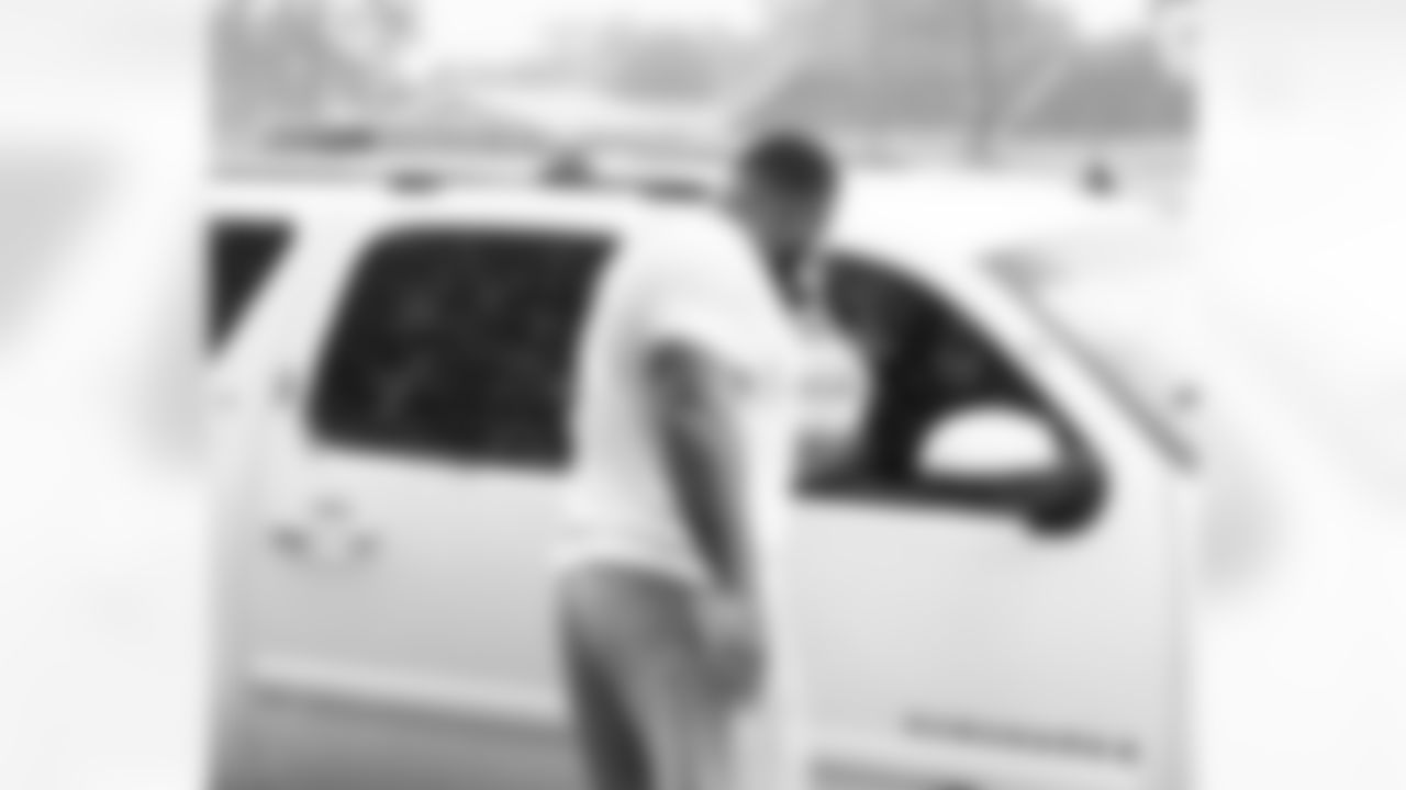 New Orleans Saints defensive tackle Davon Godchaux hosted a Thanksgiving turkey distribution for local residents at the COPAC Community Center on Nov. 25, 2025. The Plaquemine High School football team assisted Godchaux in the giveaway.