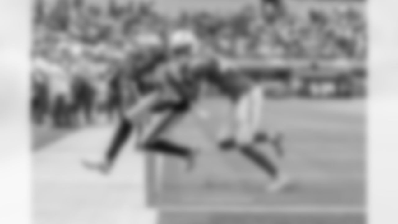 Los Angeles Chargers cornerback Michael Davis (43) pushes Las Vegas Raiders Davante Adams (17) out of bounds in an NFL football game, Sunday, Oct. 1, 2023, in Inglewood, Calif. Chargers won 24-17.