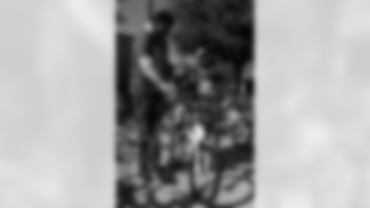 New Orleans Saints quarterback Tyler Shough and defensive end Cam Jordan joined Raising Cane's to surprise 100 kids from the Boys and Girls Club of Metro Louisiana with new bikes and helmets for the holidays on Tuesday, Dec. 9, 2025.