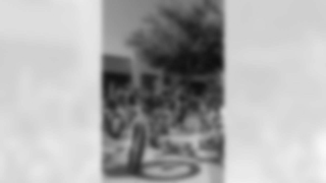 New Orleans Saints quarterback Tyler Shough and defensive end Cam Jordan joined Raising Cane's to surprise 100 kids from the Boys and Girls Club of Metro Louisiana with new bikes and helmets for the holidays on Tuesday, Dec. 9, 2025.