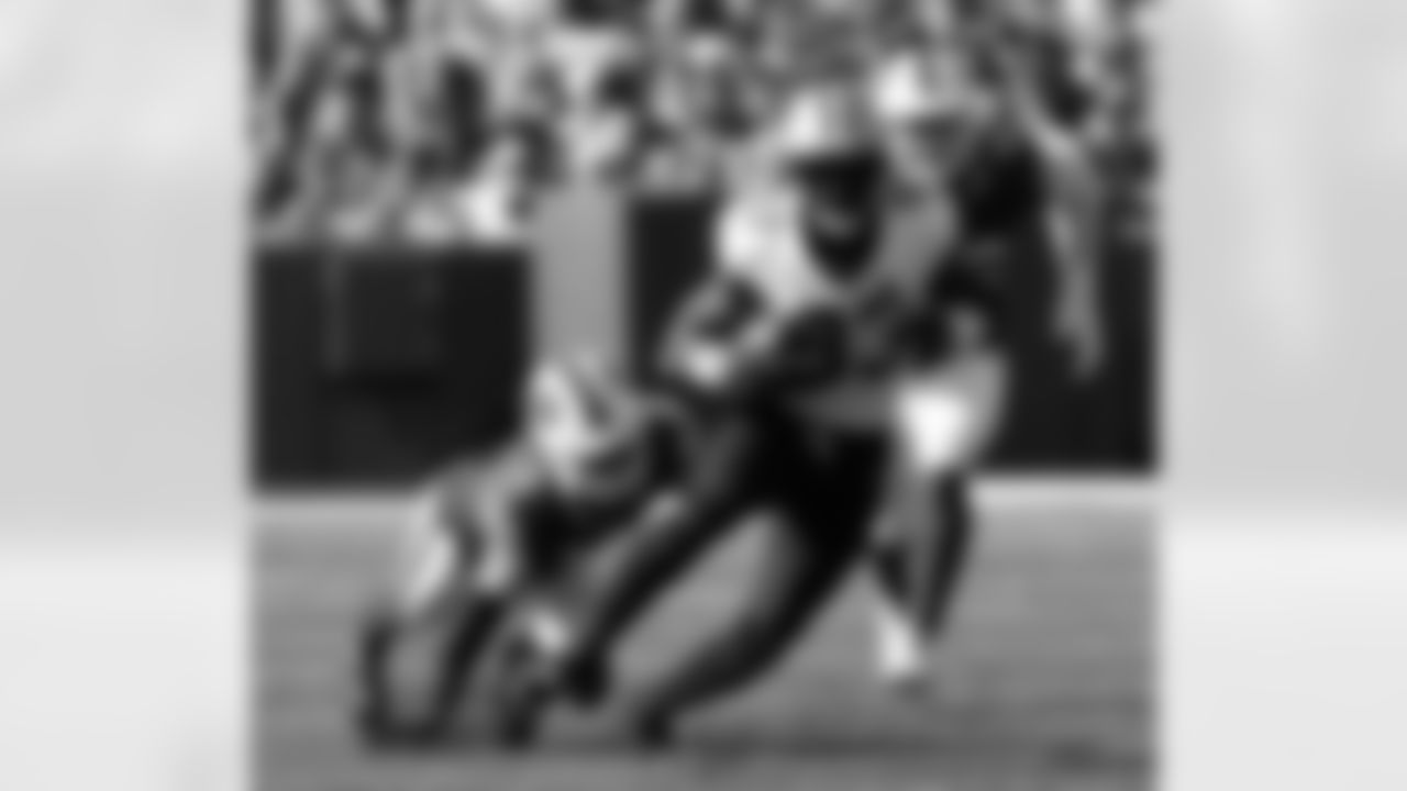 TE Juwan Johnson (83) carries the ball during the New Orleans Saints game against the Buffalo Bills for Week 4 of the 2025 NFL Season on Sept. 28, 2025 at Highmark Stadium.