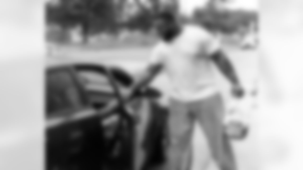 New Orleans Saints defensive tackle Davon Godchaux hosted a Thanksgiving turkey distribution for local residents at the COPAC Community Center on Nov. 25, 2025. The Plaquemine High School football team assisted Godchaux in the giveaway.