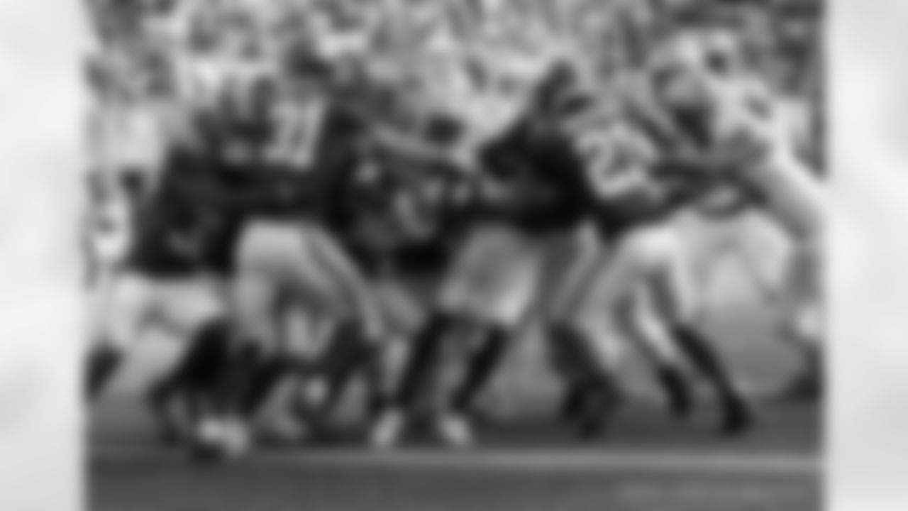 RB Kendre Miller (25) pile rushes into the end zone for the touchdown during the New Orleans Saints game against the New York Giants for Week 14 of the 2024 NFL Season on Dec. 8, 2024 at MetLife Stadium.