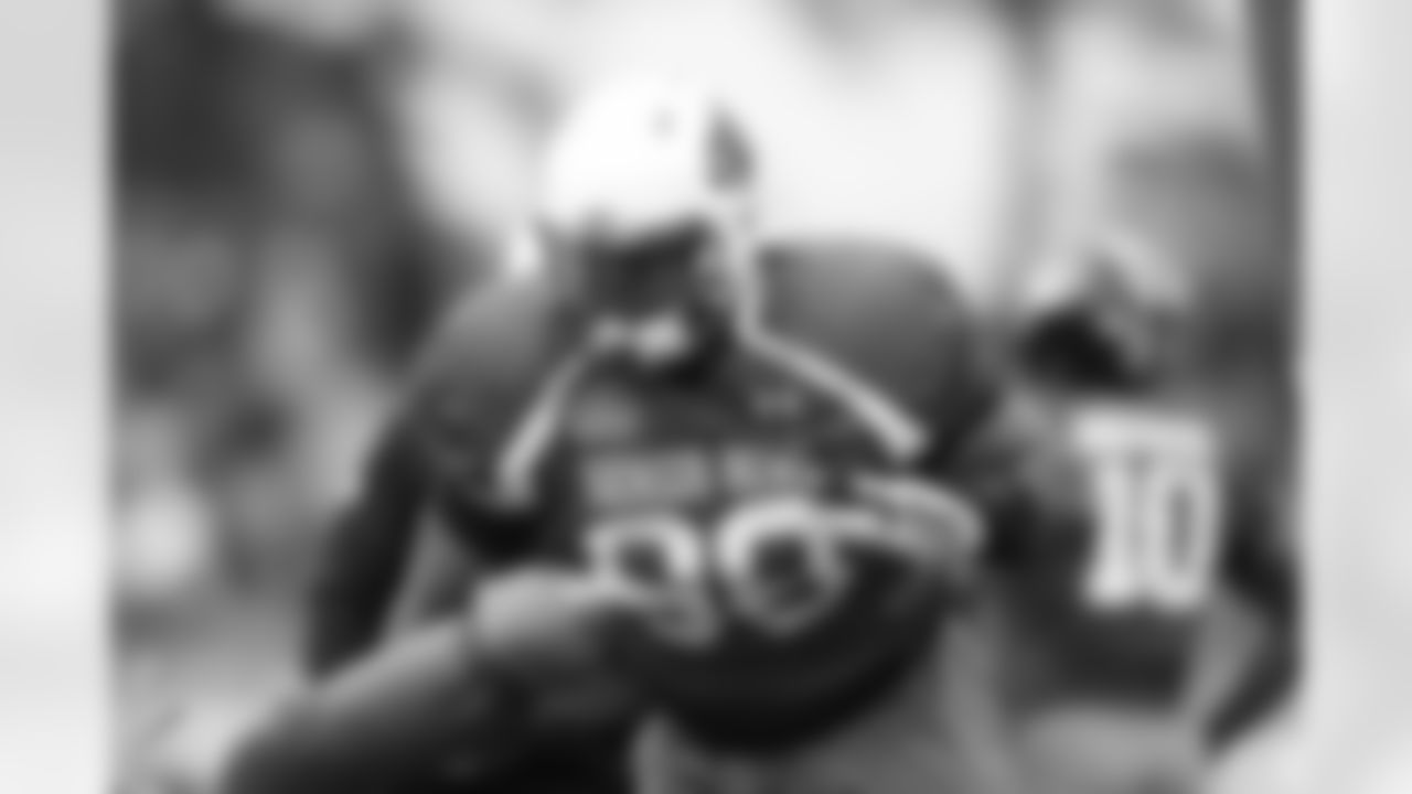 Louisville defensive end Sheldon Rankins (98) runs through drills during NCAA college football practice for the Senior Bowl, Tuesday, Jan. 26, 2016, at Fairhope Municipal Stadium, in Fairhope, Ala.