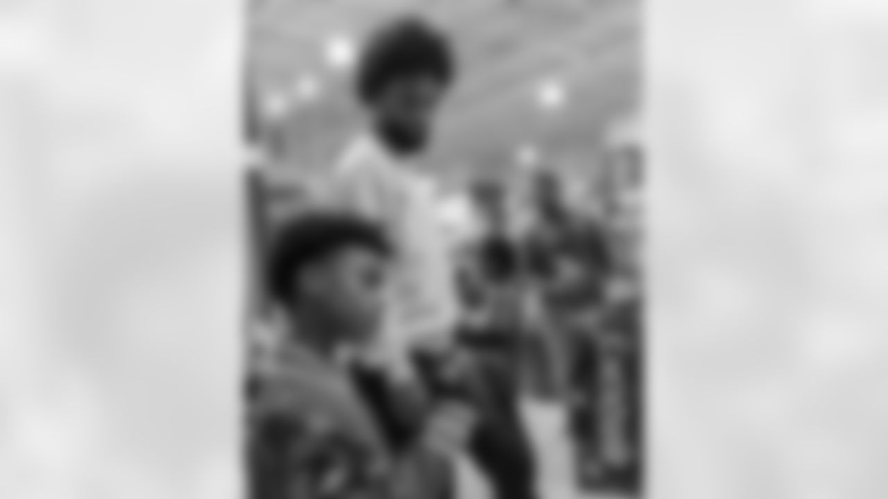 New Orleans Saints wide receiver Chris Olave surprised local youth with a holiday shopping spree in Metairie on December 9, 2025.