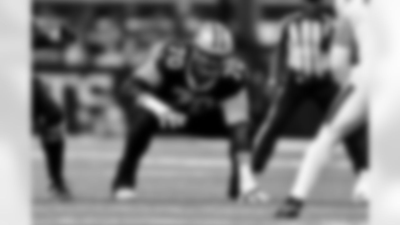 New Orleans Saints offensive tackle Trevor Penning (70) lines up in the first half during an NFL football game against the New England Patriots, Sunday, Oct. 12, 2025, in New Orleans.