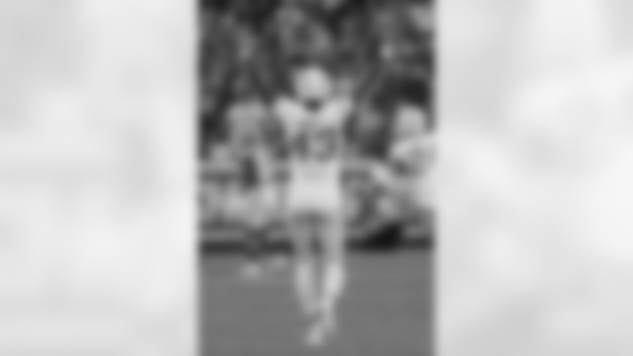 Los Angeles Chargers cornerback Michael Davis (43) raises his arms in celebration following a turnover against the Kansas City Chiefs during a NFL football game, Sunday, Oct. 22, 2023 in Kansas City, Mo. The Chiefs defeated the Chargers 31-17.