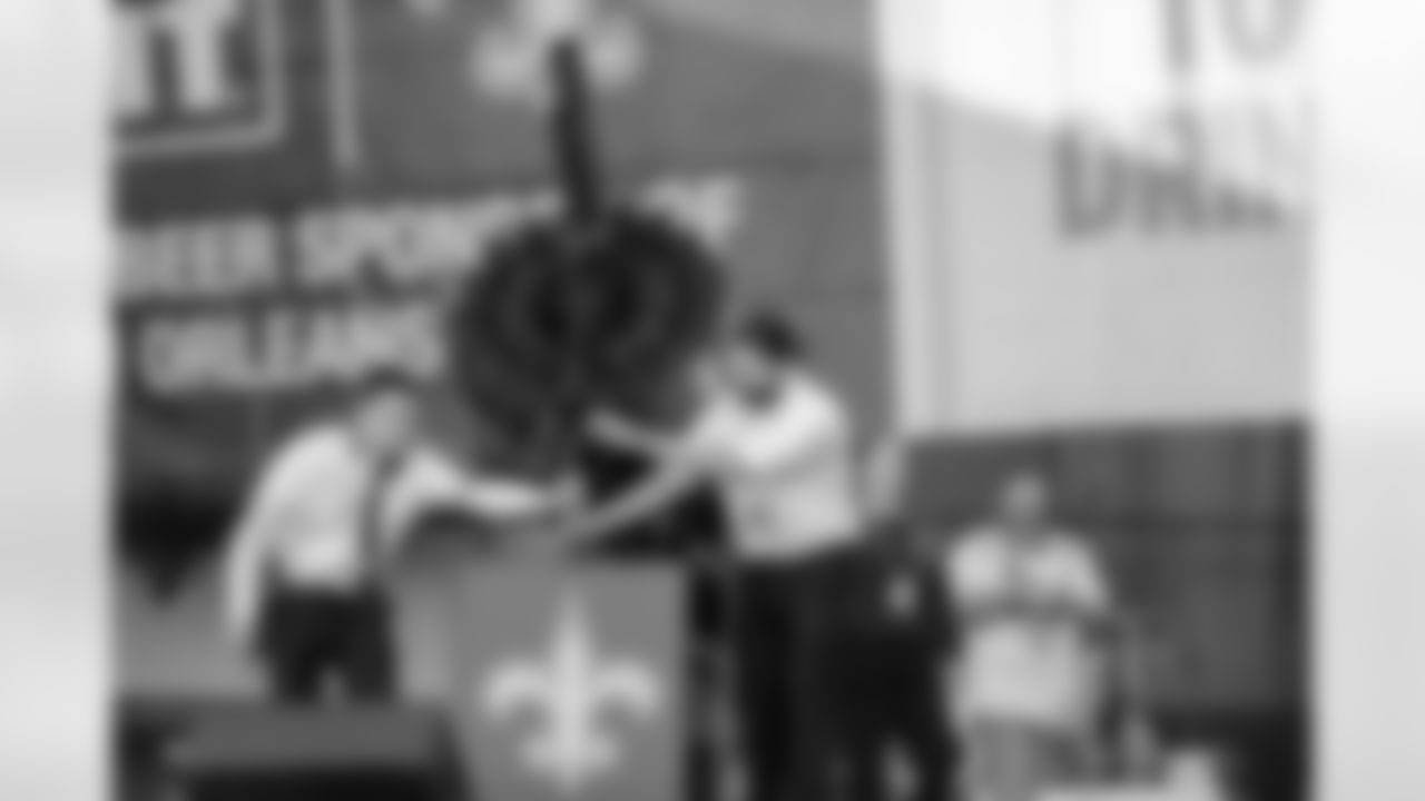Fans get ready for the Week 9 battle with a pregame party at Champions Square featuring the ringing of the bell by Saints Legend Aaron Brooks.