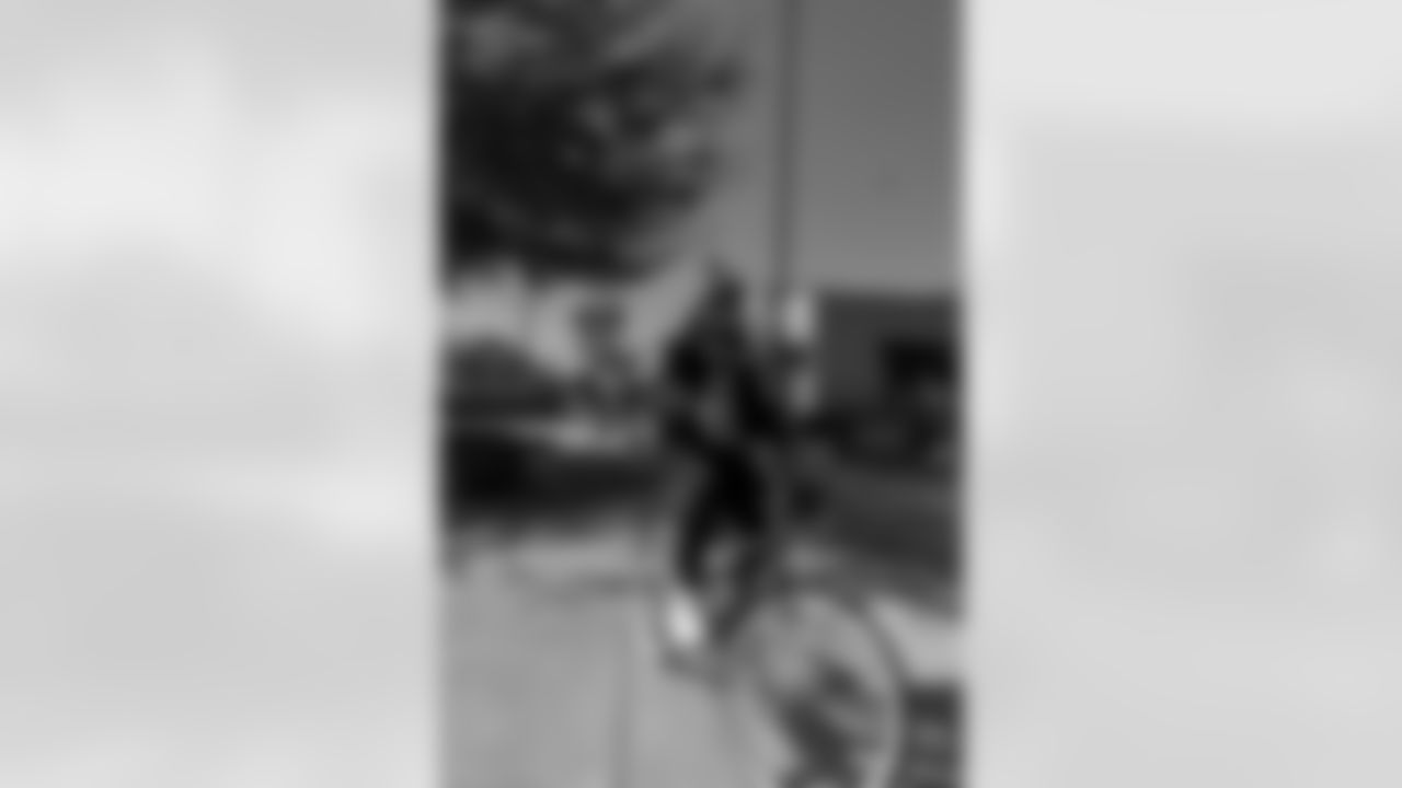 New Orleans Saints quarterback Tyler Shough and defensive end Cam Jordan joined Raising Cane's to surprise 100 kids from the Boys and Girls Club of Metro Louisiana with new bikes and helmets for the holidays on Tuesday, Dec. 9, 2025.