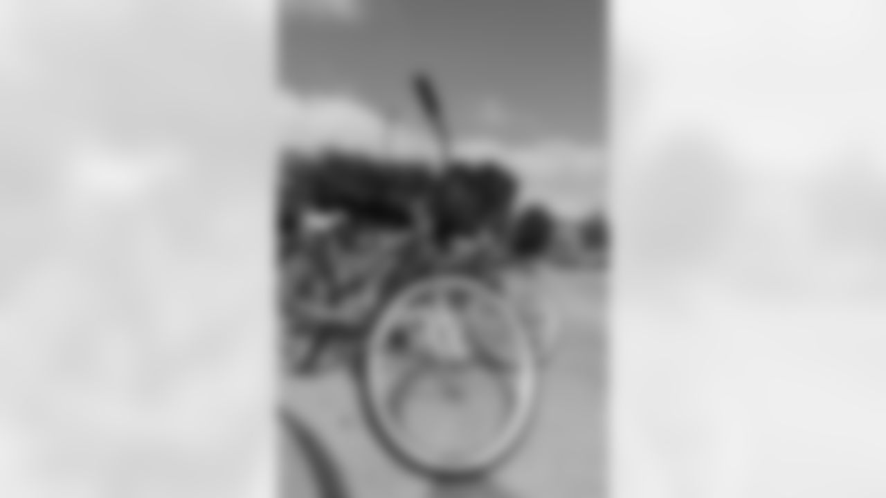 New Orleans Saints quarterback Tyler Shough and defensive end Cam Jordan joined Raising Cane's to surprise 100 kids from the Boys and Girls Club of Metro Louisiana with new bikes and helmets for the holidays on Tuesday, Dec. 9, 2025.