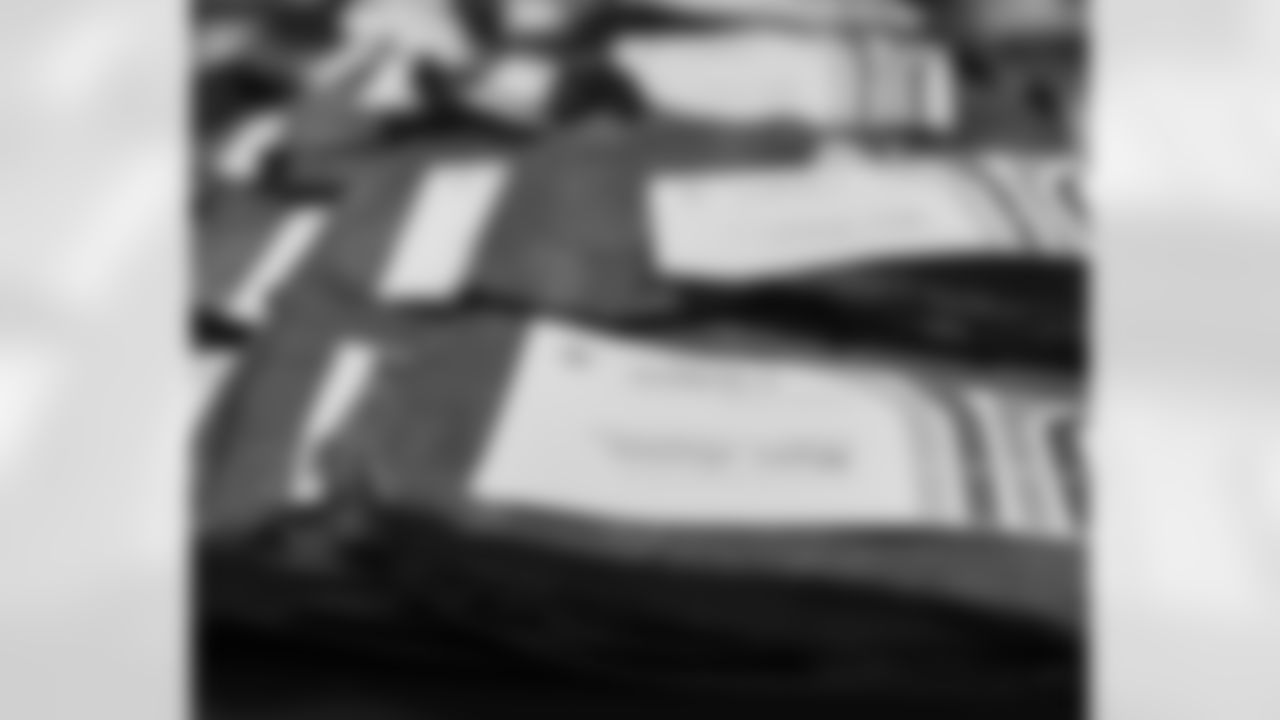 New Orleans Saints linebacker Demario Davis and his Devoted Dreamers Foundation teamed up with Ochsner to donate books and read to students during their Laureate Academy Book Fair on Tuesday, Dec. 9, 2025.