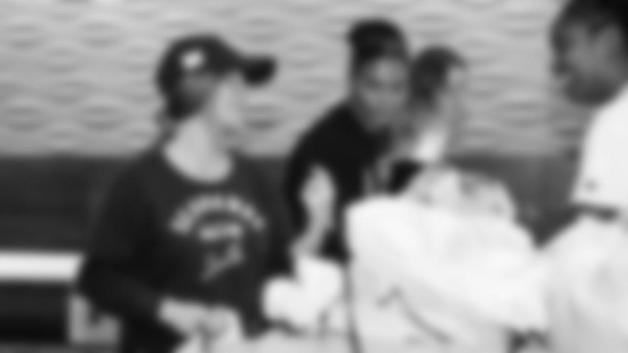 The Seahawks Women's Association packed girls flag kits and hosted a free girls flag football camp at the Seahawks training facility on Saturday, November 8, 2025.