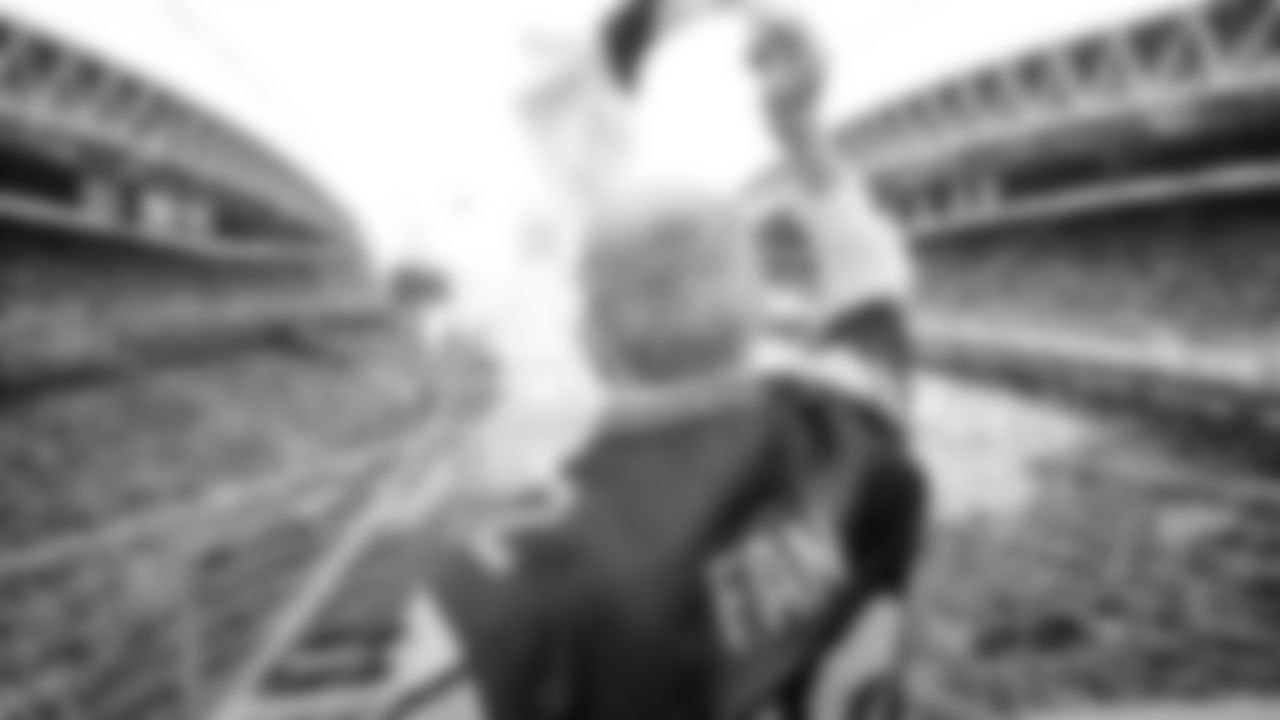 Brigadier General Richard Steve Ritchie "Cinco" of United States Air Force, raised the 12 Flag prior to kickoff of the Week 10 matchup vs. the Cardinals.