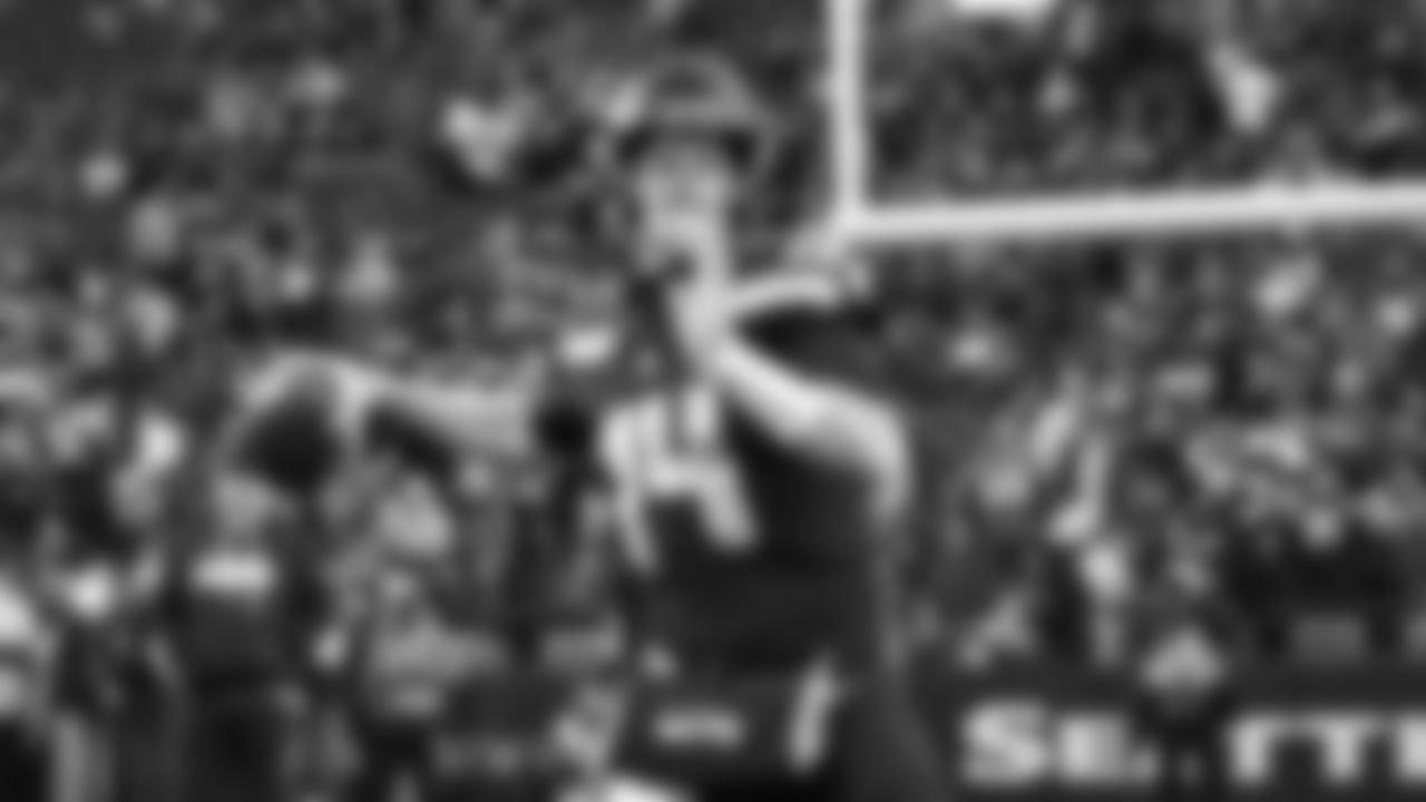 Seahawks quarterback Sam Darnold (14) warms up at Lumen Field for the NFC divisional round game vs. the San Francisco 49ers on January 17, 2026.