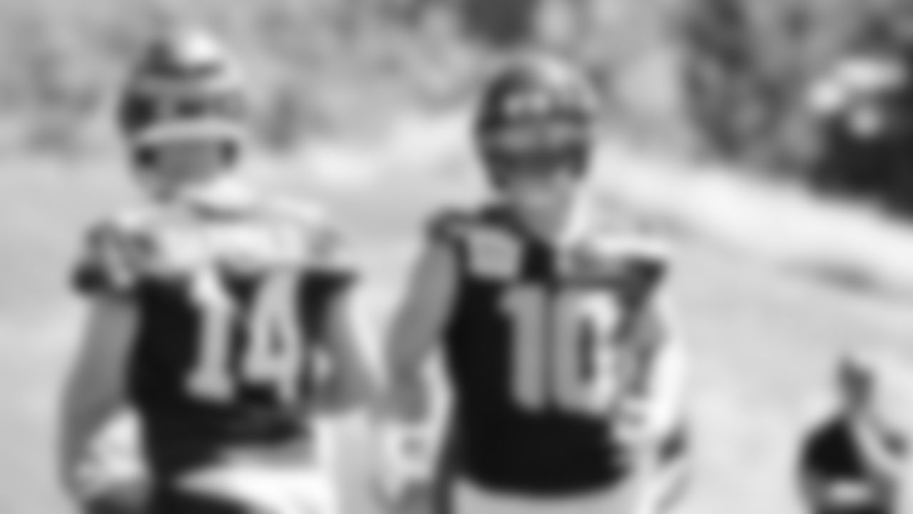 Seahawks quarterback Sam Darnold (14) and wide receiver Cooper Kupp (10) participated in a workout on day one of minicamp on Tuesday, June 10, 2025 at the Virginia Mason Athletic Center.
