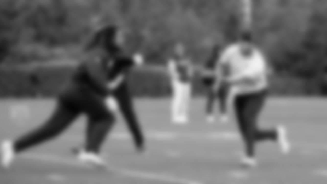 Seahawks quarterback Sam Darnold (14) and running back Damien Martinez (22) participated in a workout on May 20, 2025 at the Virginia Mason Athletic Center.