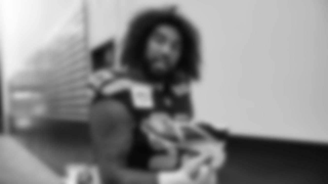 Seahawks defensive end Leonard Williams (99) unboxed his My Cause My Cleats at the Virginia Mason Athletic Center.