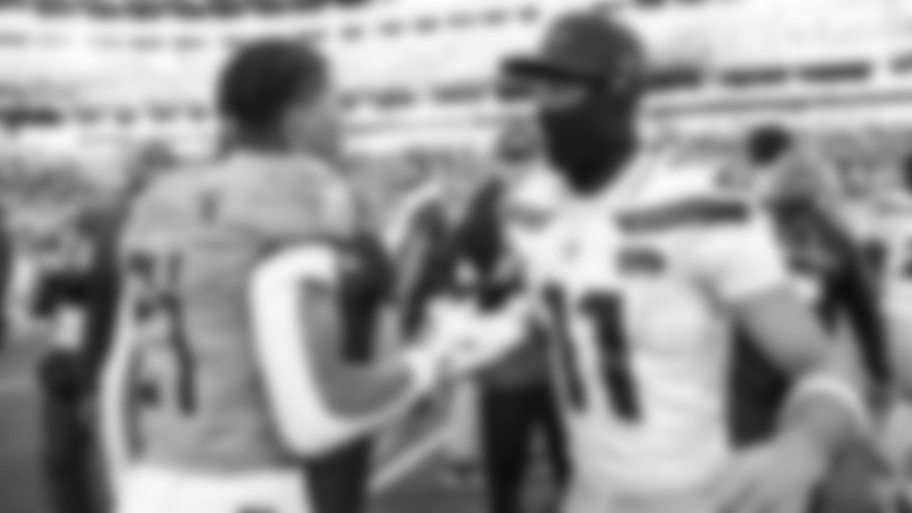 Seahawks celebrate the 30-24 win over the Tennessee Titans at Nissan Stadium on November 23, 2025.