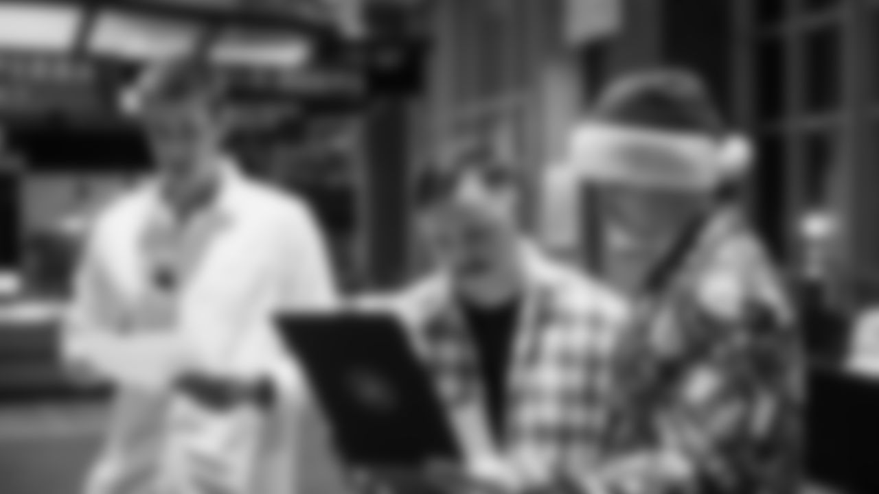 The Seahawks donated $2,500 to the Coast Guard Foundation and surprised 100 service members and their families with Seahawks talent and swag during their holiday event on December 11, 2025.