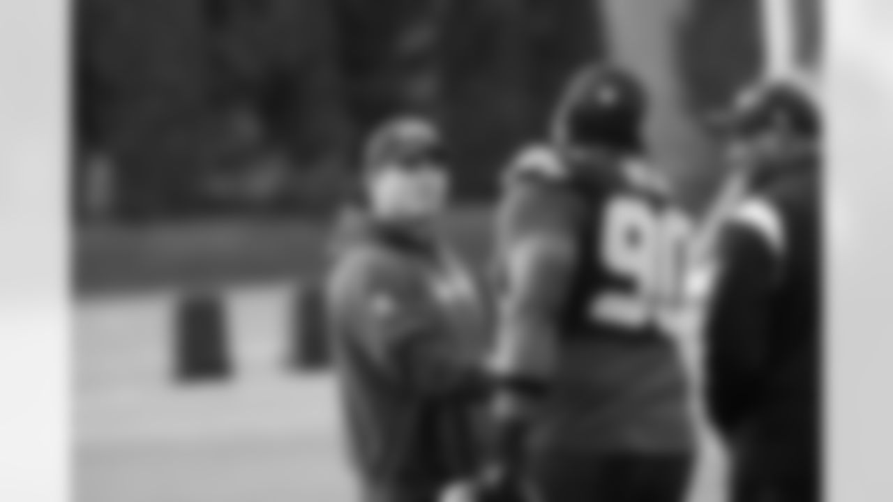 Seahawks head coach Mike Macdonald and nose tackle Jarran Reed (90) practiced at the Virginia Mason Athletic Center on Thursday, December 5, 2024.