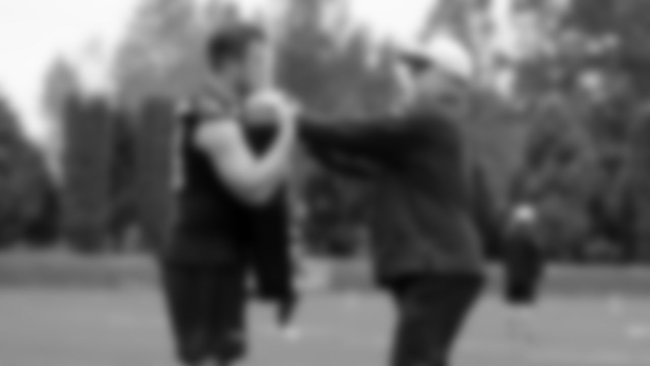 Seahawks offensive lineman Mason Richman (78) with offensive line coach John Benton during a workout on May 13, 2025 at the Virginia Mason Athletic Center.