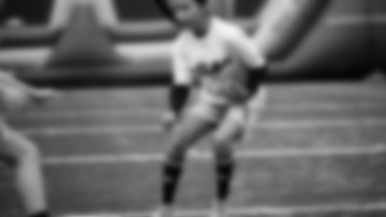 The Seahawks Women's Association packed girls flag kits and hosted a free girls flag football camp at the Seahawks training facility on Saturday, November 8, 2025.