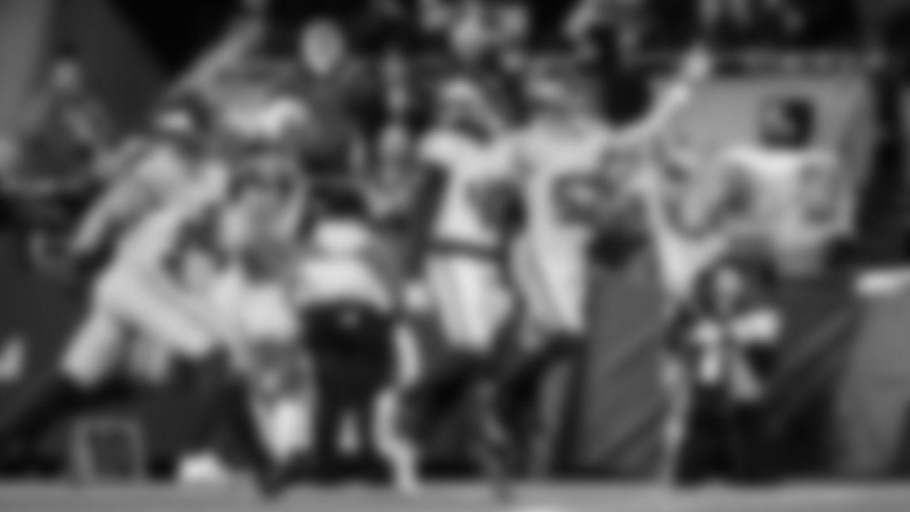 Seahawks special teams members celebrate a stop.