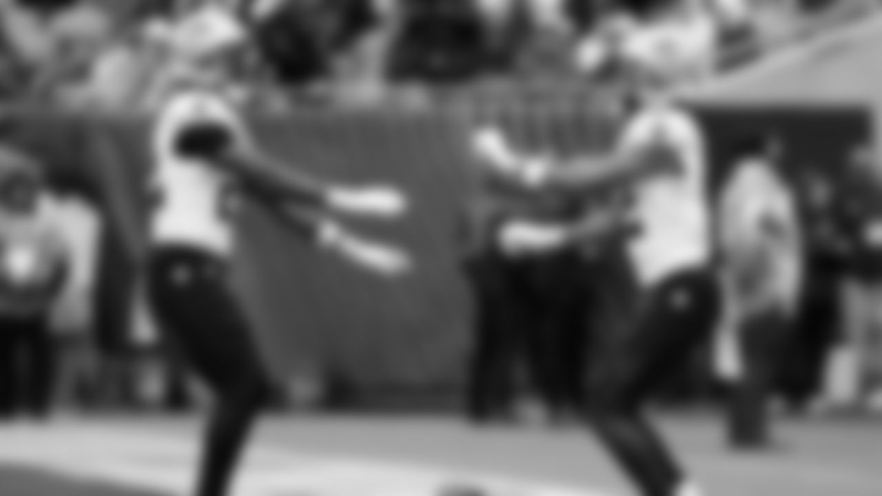 New Orleans Saints wide receiver Chris Olave (12) celebrates with New Orleans Saints wide receiver Rashid Shaheed (22) after scoring a touchdown against the Chicago Bears during the first half of an NFL football game, Sunday, Oct. 19, 2025, in Chicago. (AP Photo/Kamil Krzaczynski)