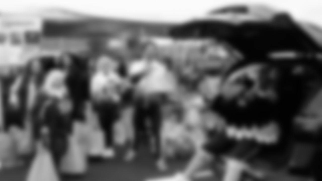 Seahawks Legend Marcus Trufant, quarterback Jalen Milroe, Blitz and the Seahawks Dancers participated in the Tacoma Police Department and Friends Thanksgiving Turkey Giveaway on November 18, 2025.