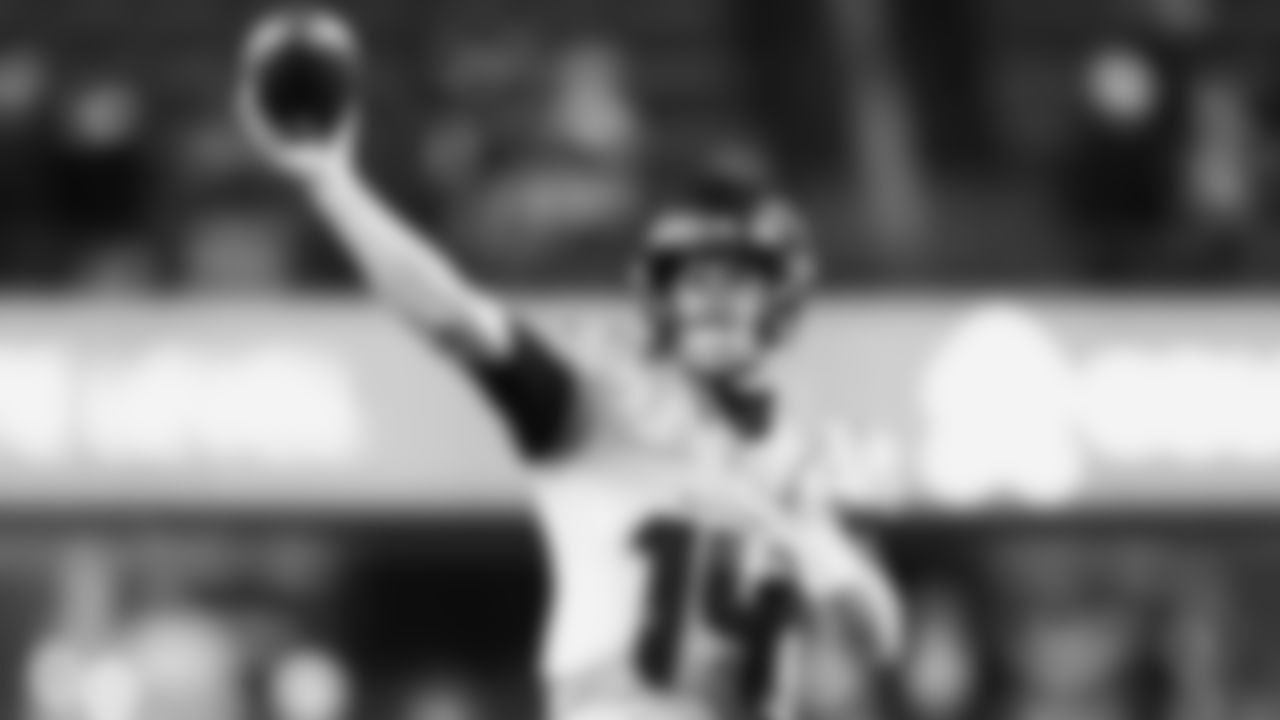 Seahawks quarterback Sam Darnold (14) warms up at Lumen Field for the Week 16 matchup vs. the L.A. Rams.