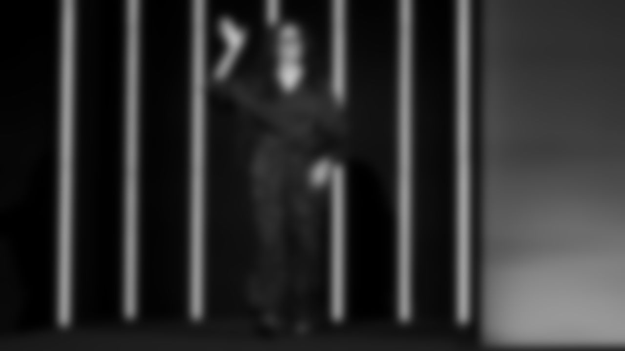 ASL interpreter Celimar Cosme walks to the stage at the Apple Music Halftime Show press conference ahead of the Super Bowl 60 football game on Thursday, February 5, 2026 in San Francisco. (Logan Bowles/NFL)