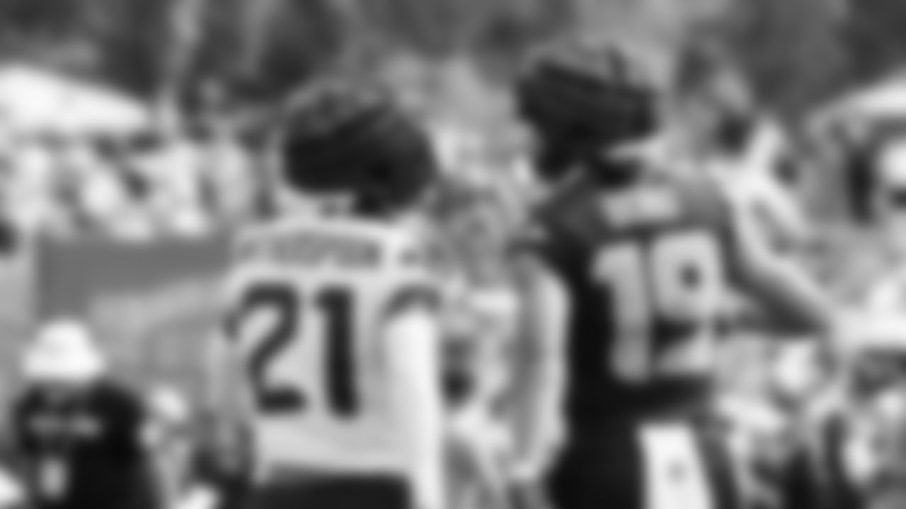 Seahawks cornerback Devon Witherspoon (21) and wide receiver Jake Bobo (19) practiced on August 1, 2025 at the Virginia Mason Athletic Center.