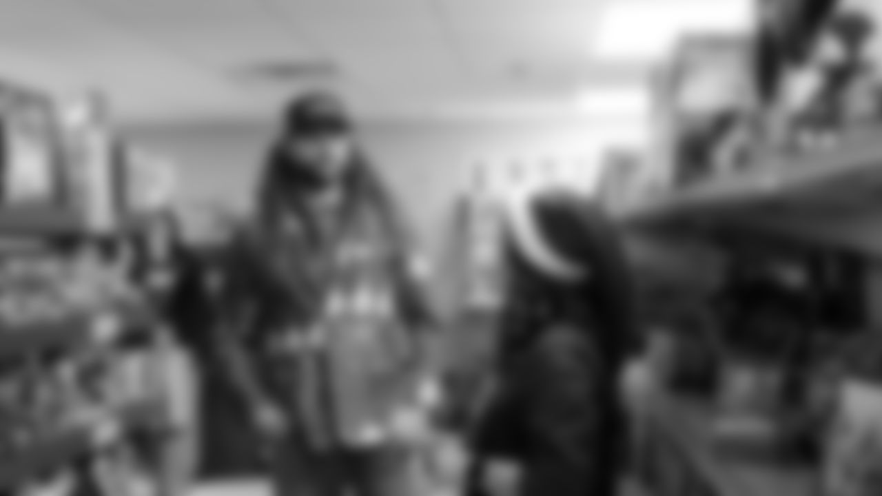 Seahawks Fullback Brady Russell, the Seahawks Dancers, and Blitz spent the day volunteering at Santa's Castle on Joint Base Lewis-McChord to celebrate the holidays and support service members and their families.