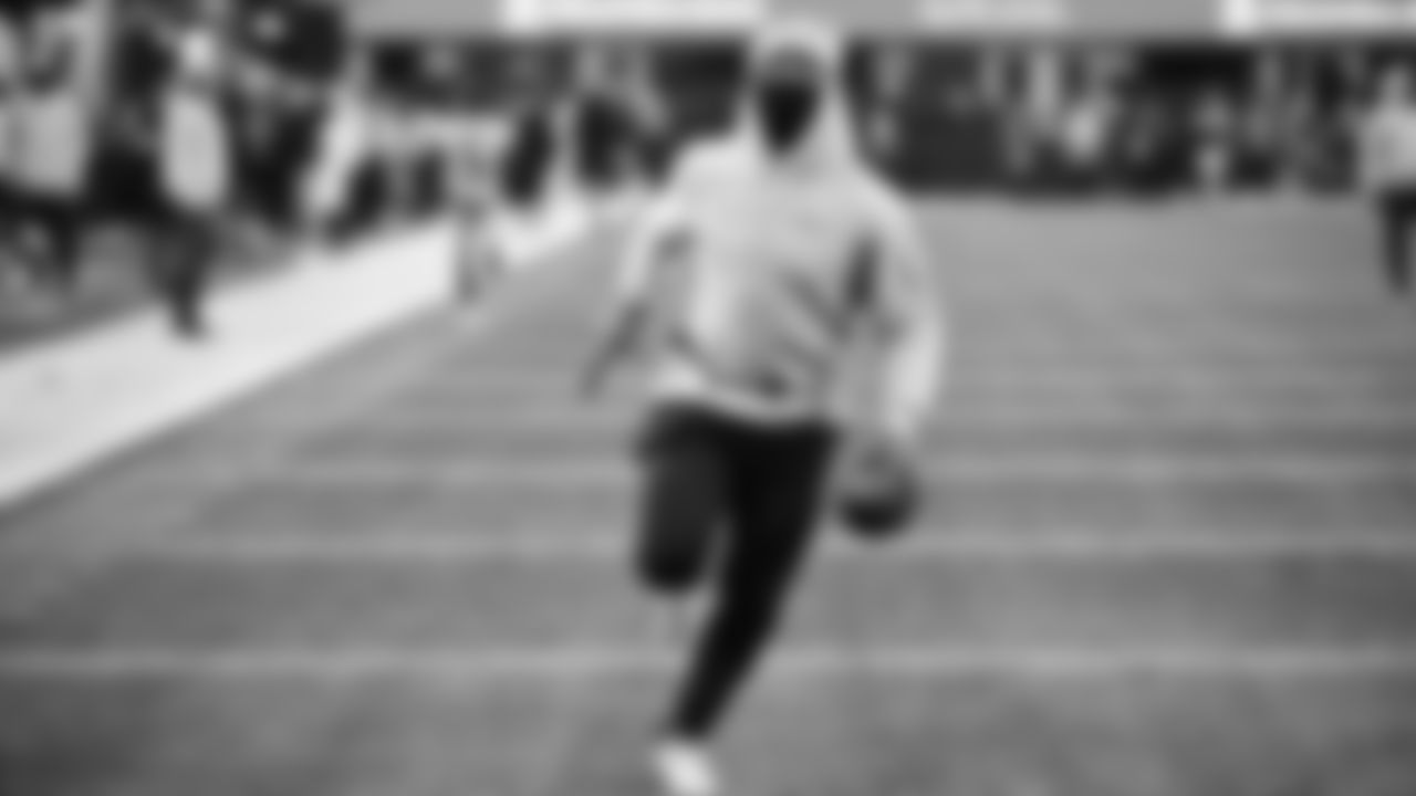 Seahawks running back Kenneth Walker III (9) warms up at Lumen Field for the Week 16 matchup vs. the L.A. Rams.